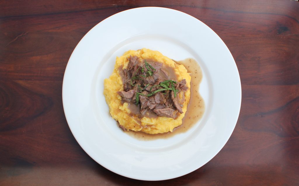 Guinness Lamb over Irish Cheddar Polenta