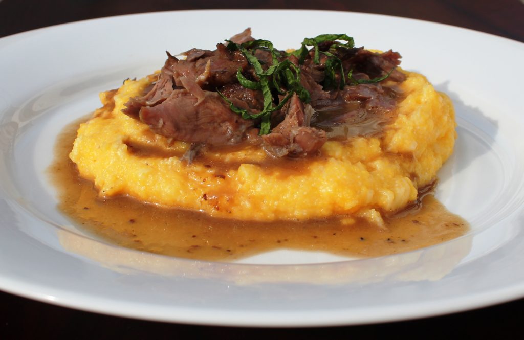 Guinness Lamb over Irish Cheddar Polenta