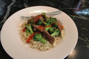 beef and broccoli with cauliflower rice sriracha