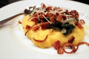 polenta with sauteed spinach and bacon with fried shallots